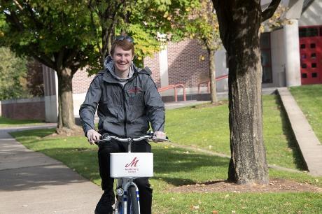 Zagster - Student Riding Bike
